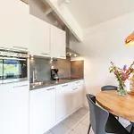 Apartment In By The